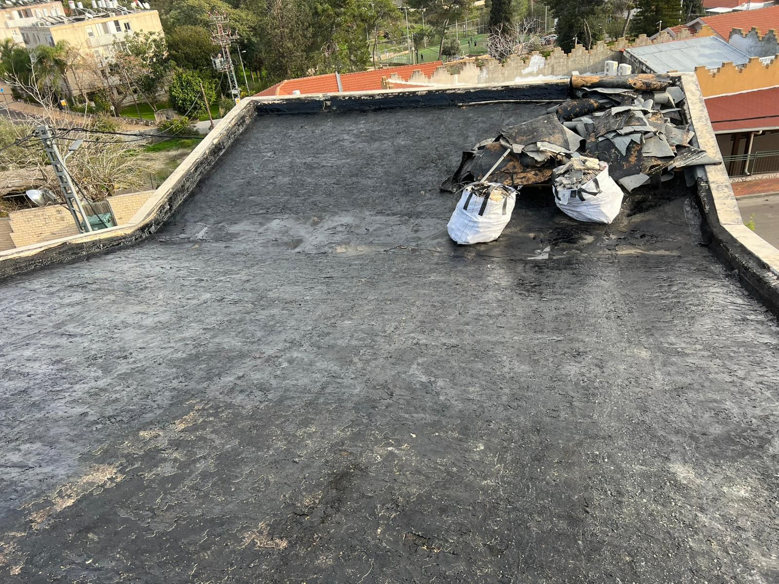 פינוי שכבות איטום ישנות מהגג